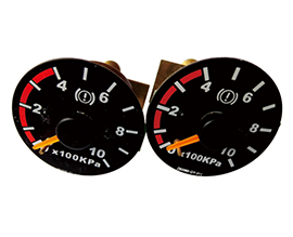 How do pressure gauges prevent corrosion?